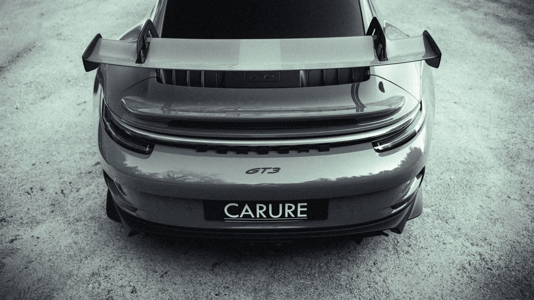 Arrière de la Porsche 911 GT3 Carure en noir et blanc